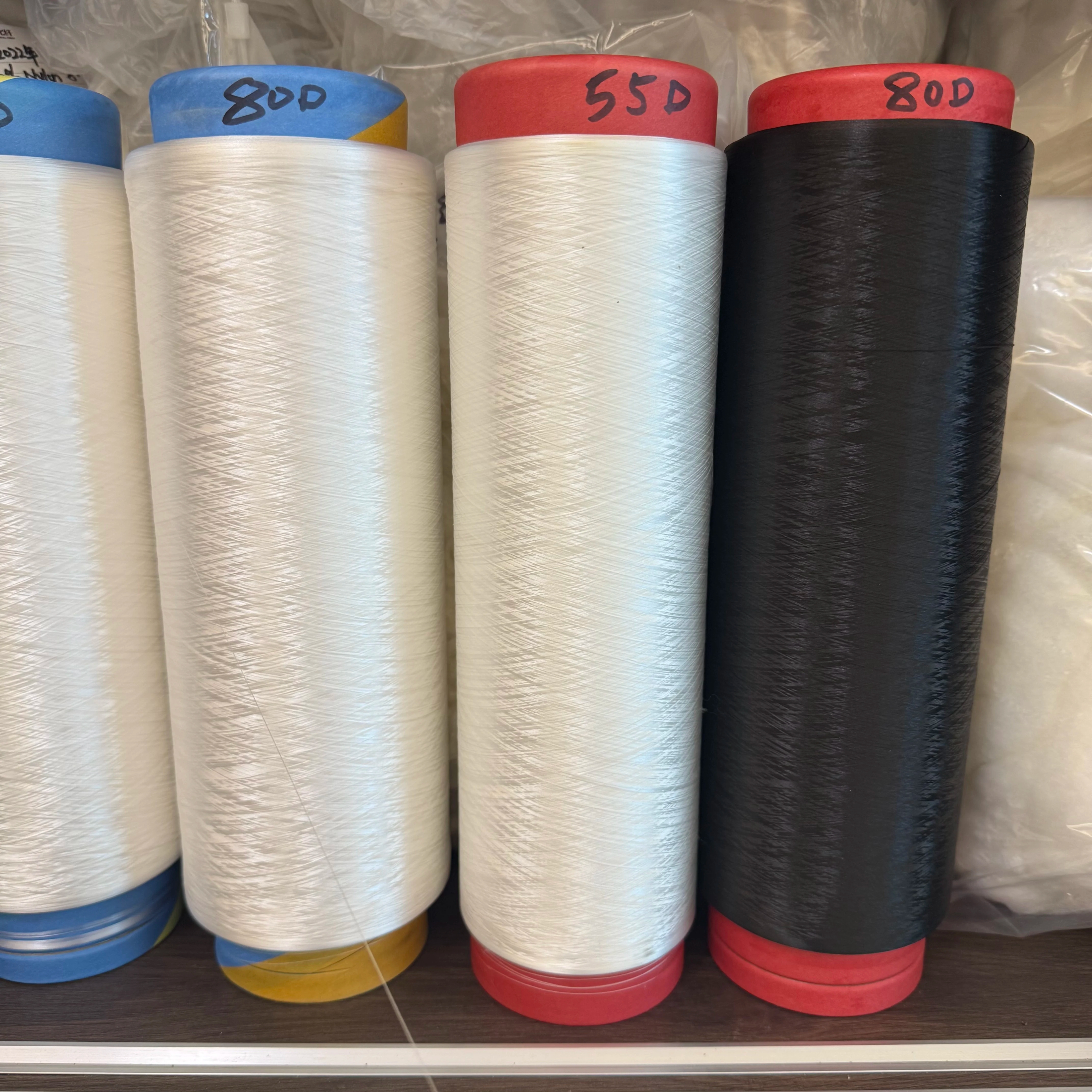 factory supply Polyester Spandex PBT Filament Yarn 55D/24F 75D/24F Nylon Fiber Solid Virgin Raw Core Spun Yarn Spinning Stock